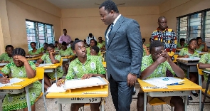 Rev. John Ntim Fordjour interacting with BECE candidates at the St. Thomas Aquinas SHS