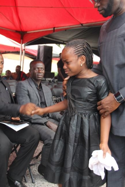 Daughter of late Statcy Offei-Darko in a sorrowful mood