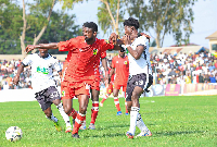 Players of All Blacks and Kotoko during the game