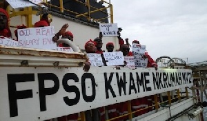 MODEC workers showing placards
