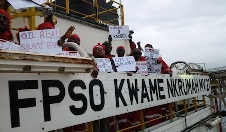 MODEC workers showing placards