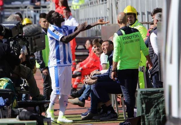 Sulley Muntari protests to fans over the colour of his skin after the alleged racist insults