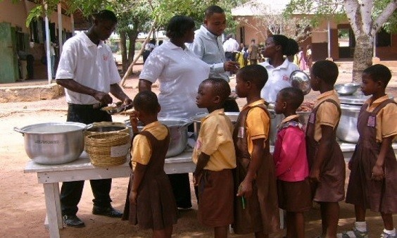 School feeding caterers serving pupils