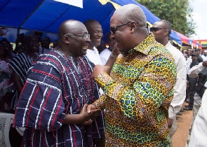 Former President John Dramani Mahama in a handshake with Vice President, Mahamudu Bawumia