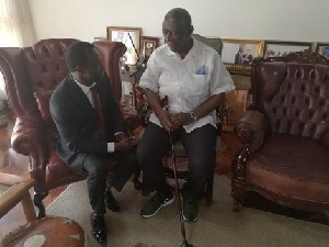 Former President J. A. Kufuor with Fred Amankwah