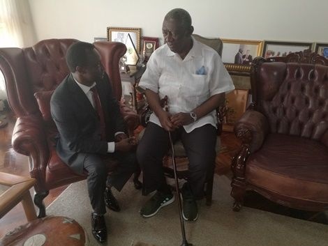 Former President J. A. Kufuor with Fred Amankwah