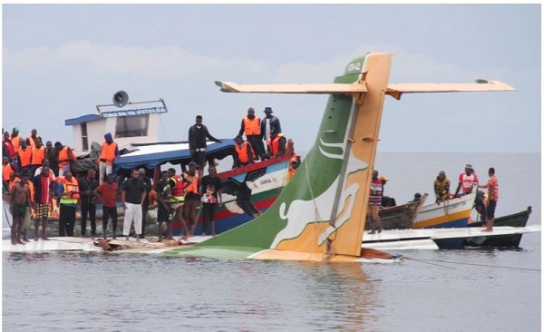 Rescuers attempt to recover the Precision Air passenger plane that crashed into Lake Victoria