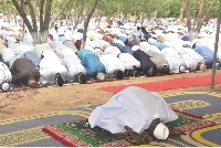 Some Muslims praying