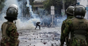 Kenya's interior minister says police officers acted with 'remarkable restraint'