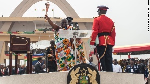 The new president Nana Akufo-Addo waving a Ghanian traditional gold sword during the inauguration