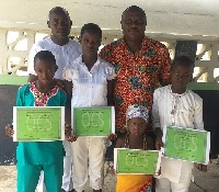 The students with their scholarship certificates
