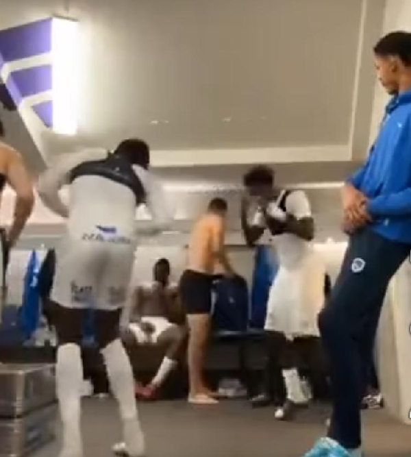 Baah and Tolu dancing in the dressing room