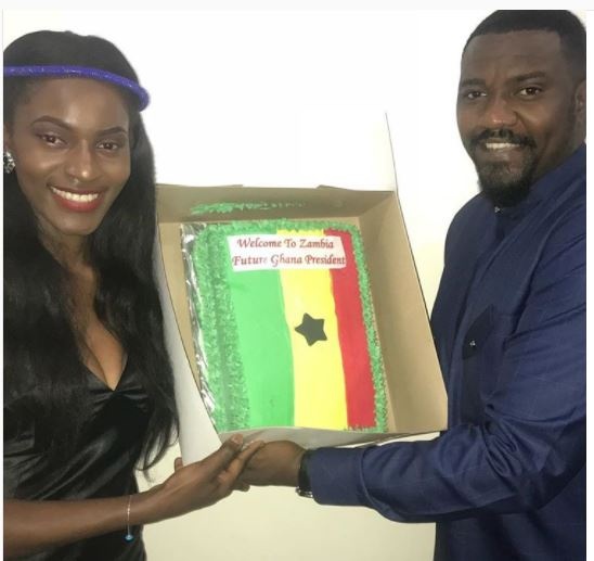 John Dumelo receiving a cake confirming his ambitions to become President of Ghana