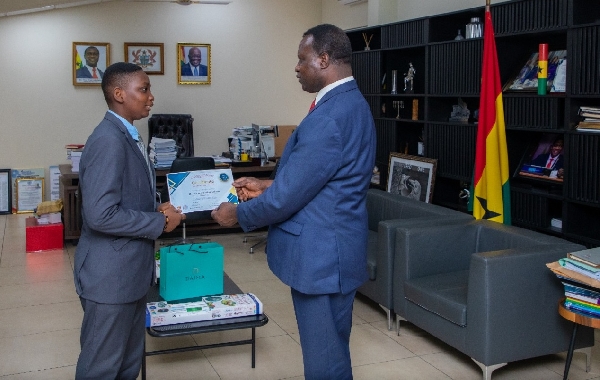 Dr Yaw Adutwum with the young Dr Kwaku Boakye Gyamfi