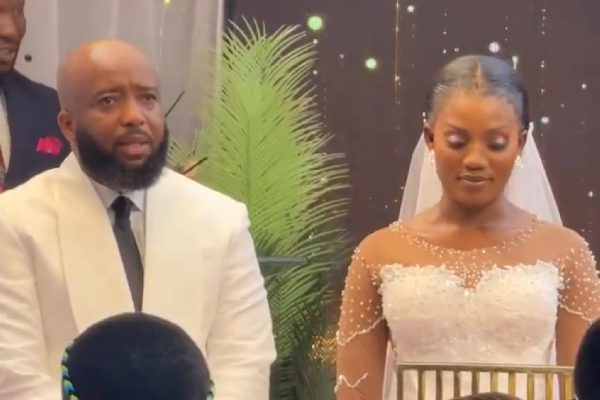 Rapper Trigmatic and his new wife during their wedding