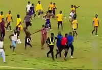 Fans trooped to the field as they tried to beat the referee