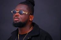 Wan O shares amount he makes from selling CDs at Accra Mall