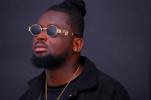 Wan O shares amount he makes from selling CDs at Accra Mall