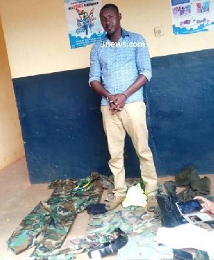 Issah Abdul Mubarik arrived at the police station in a military uniform to hand over a 'suspect'