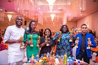 Staff of Access bank displaying their awards