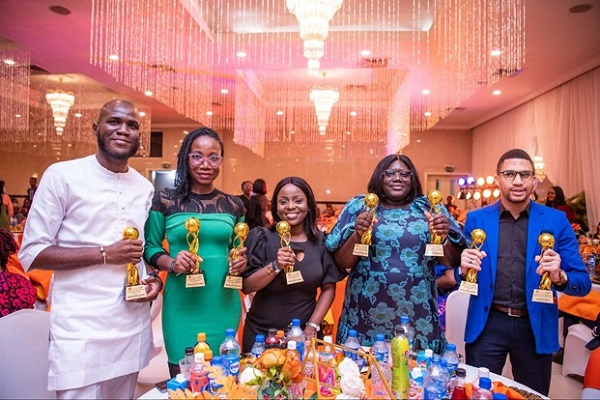 Staff of Access bank displaying their awards