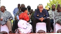 Anita Desoso, National Vice Chairperson of the NDC kneeling before Rawlings