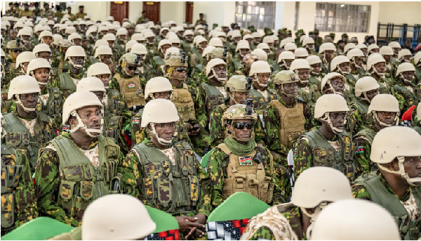 Kenyan police officers attend a pre-departure briefing for the first contingent of police officers