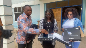 Professor Kingsley Nyarko (left) inspecting the tablets