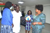 Mrs Tina Gifty Naa Ayeley Mensah (right) in a chat with Dr Efua Commeh (second from left) and others