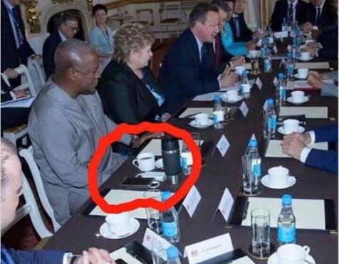 Red marking shows Mahama charging phone