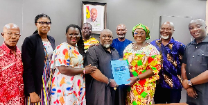 Dzifa Gomashie(3rd right) receiving the comunique