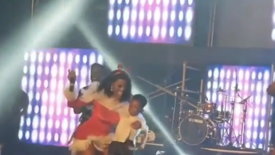Wendy Shay carries actor Don Little in her hands like a 'baby' at 2018 Rapperholic