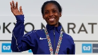 Kenyan athlete Sarah Chepchirchir poses at women's medal ceremony in Tokyo, Japan