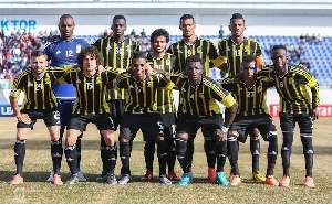 Sulley Muntari in the Al Ittihad's squad.