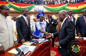 President Akufo-Addo exchanging pleasantries with MPs
