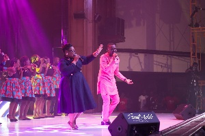 Joe Mettle performing on stage at his concert