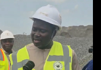A file photo of an official inspecting the site