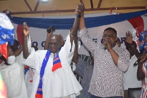 Isaac Darko (right) declares Ambrose Dery duly elected NPP aspirant
