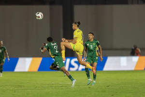 Players of Ghana and South Africa engaged in a duel during the game