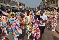 Takoradi MP, Kwabena Okyere Darko-Mensah (m) surrounded by others in a joyous celebration
