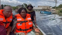 Prof. Jane Naana Opoku-Agyemang touring some flood affected communities