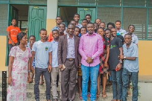 John Dumelo with some students of  Heritage Christian College (HCC)
