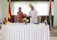 Adwoa Serwaa Bondzie and Ali Al Shimmari after the signing ceremony