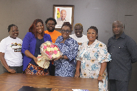 Dzifa Gomashie (in full African print) received the group at her office in Accra