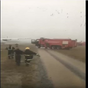 The crash, which resulted in five minor injuries, occurred after the aircraft skidded off the runway