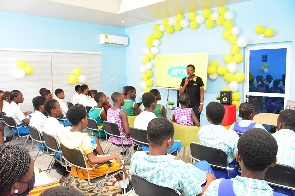 Mrs. Cynthia Mills, Economic Empowerment Advisor of MTN Ghana Foundation interacting with mentees