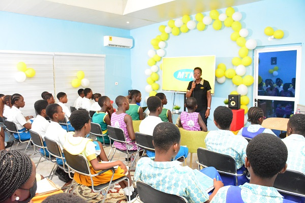 Mrs. Cynthia Mills, Economic Empowerment Advisor of MTN Ghana Foundation interacting with mentees