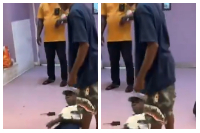 The security guard lying unconscious while the suspect continued to attack him