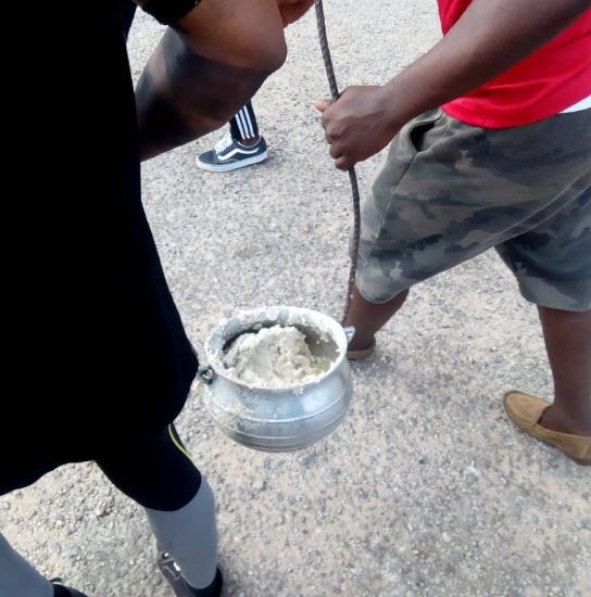 KNUST students seized a pot of banku which was on fire in the house of a security officer