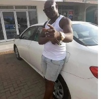 Bukom Banku poses with his new car